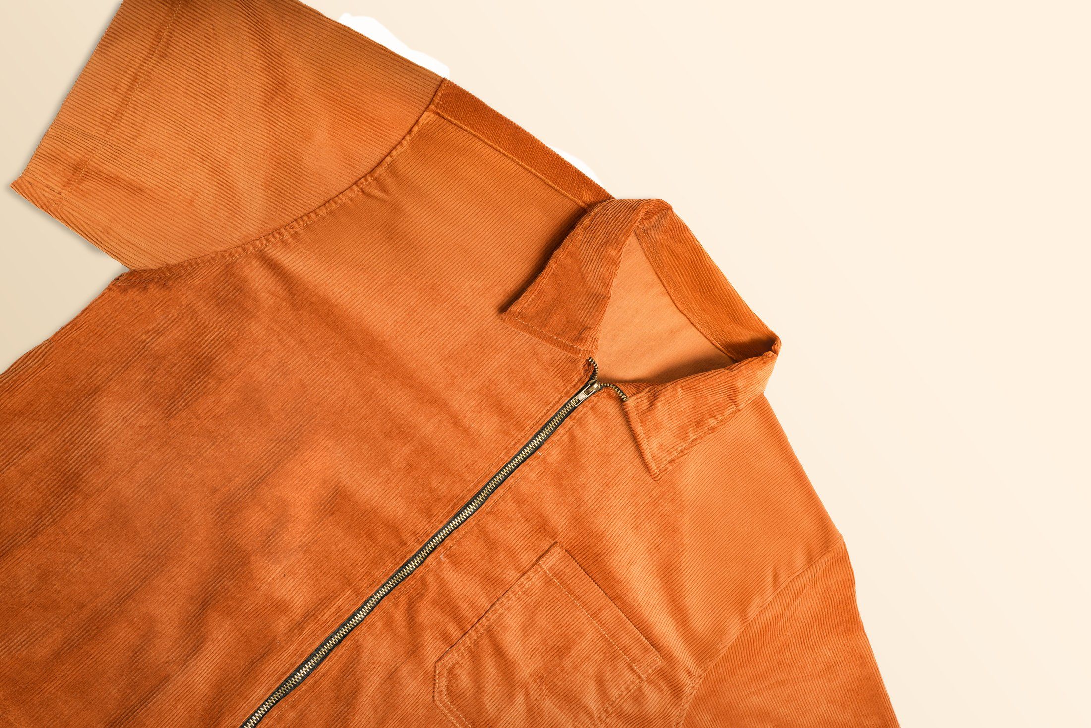 Close view of the rust workshirt collar and zip